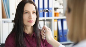 patient having special eye exam 350×640 2.jpg